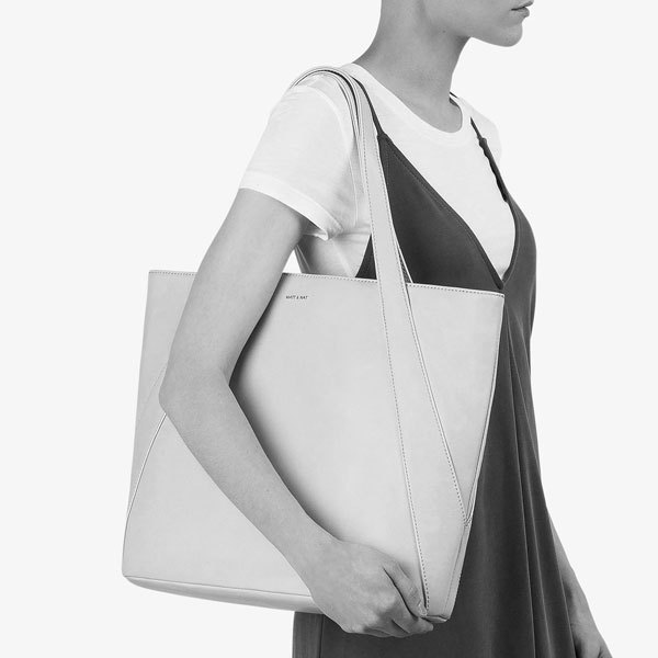 matt and nat tote bag